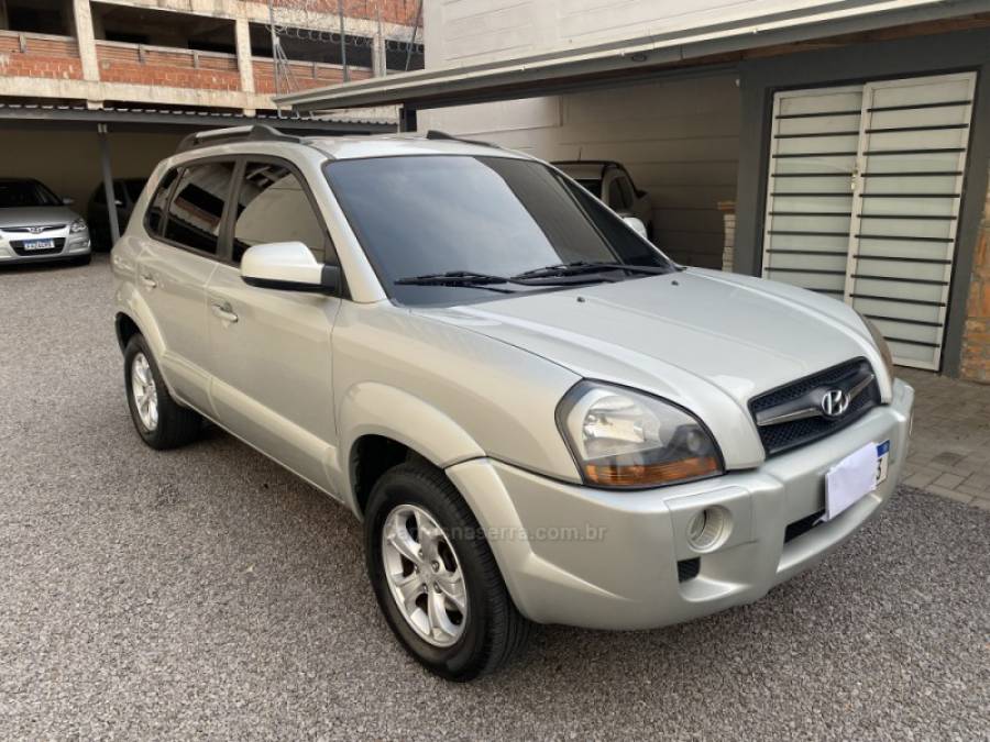 HYUNDAI - TUCSON - 2012/2013 - Dourada - R$ 51.900,00