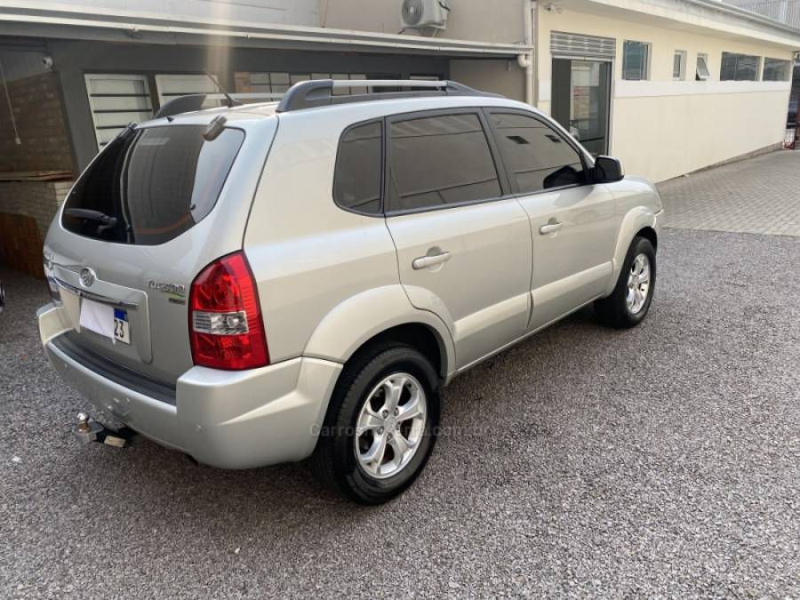 HYUNDAI - TUCSON - 2012/2013 - Dourada - R$ 51.900,00